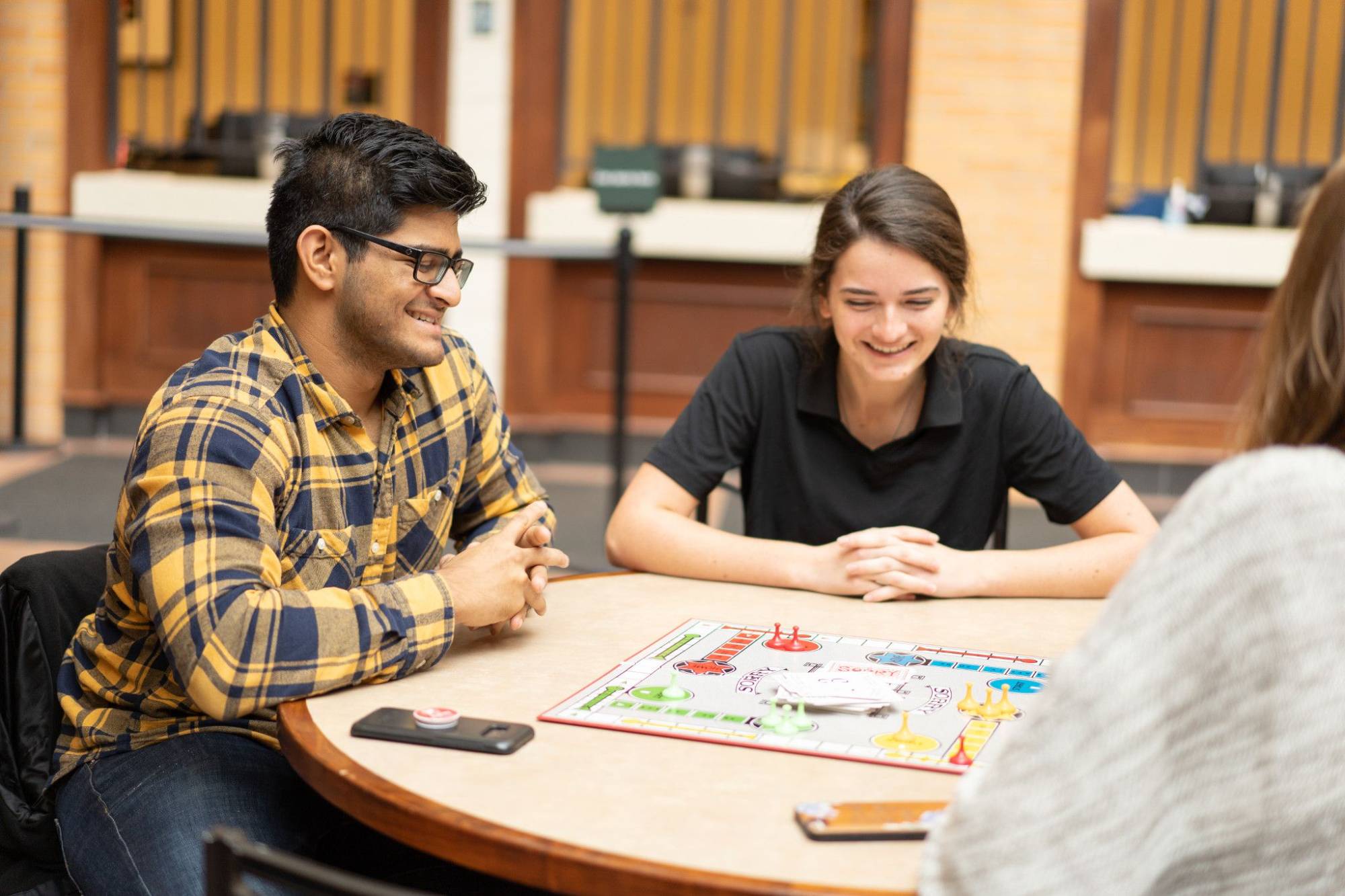 students playing the sorry board game